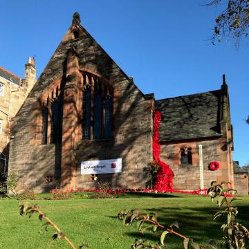 Outside of the church draped in Poppies